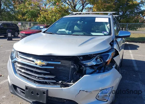 2018 Chevrolet Equinox Premier z USA, uszkodzony, nr VIN 2GNAXVEVXJ6128392